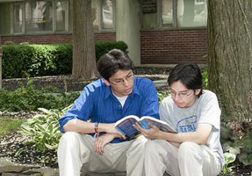 international students reading outside admissions thumbnail